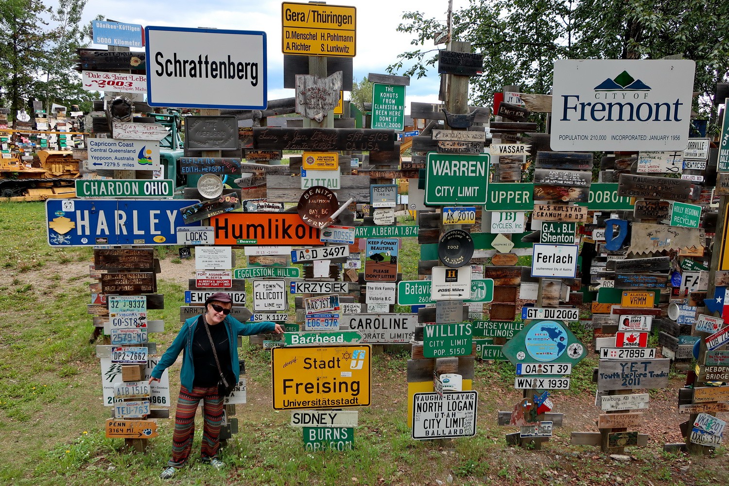 Sign Post Forest of Watson Lake with Freising - Alfred's school town!